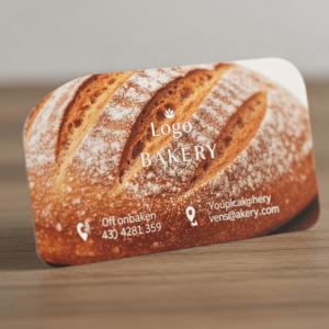 a thematic business card for a bakery in the shape of a photo-realistic bread loaf